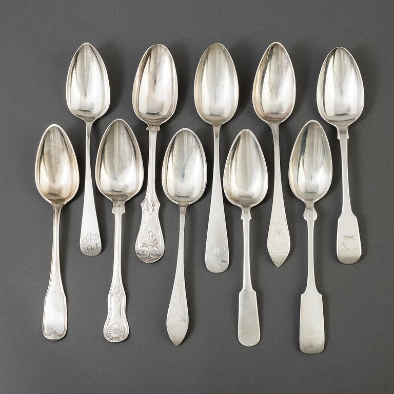 A set of 10 different spoons of different nationalities.