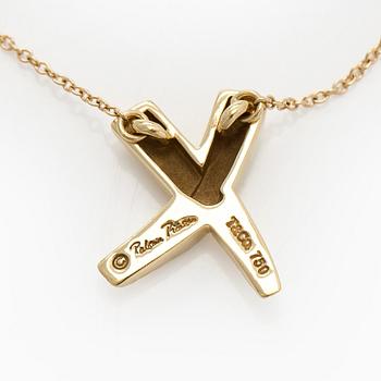 Tiffany & Co, Paloma Picasso, an 18K gold "X Kiss" necklace.
