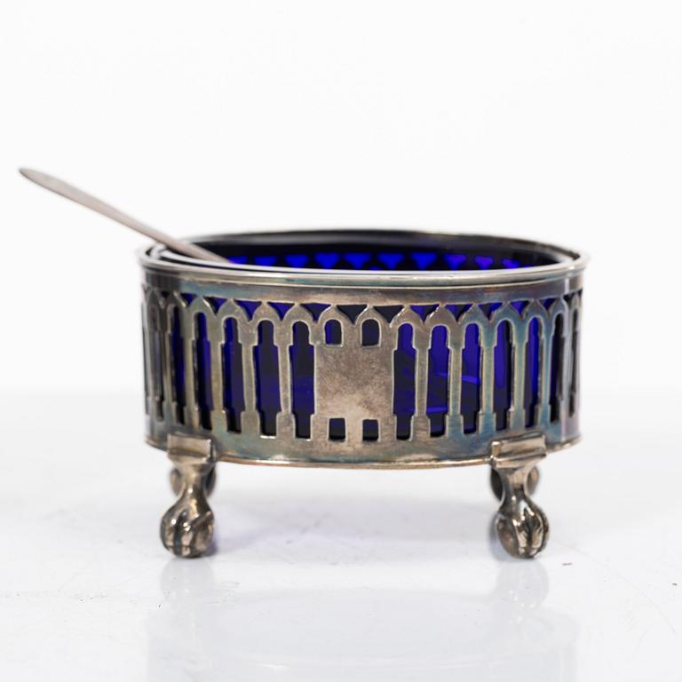 Two silver salt cellars, and a mustard pot, French hallmarks, late 18th Century.