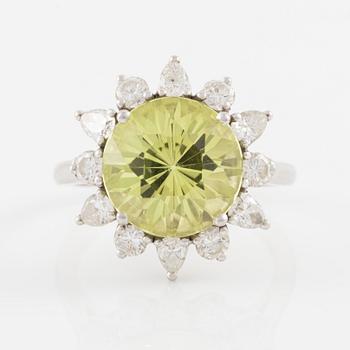 Ring, in the form of a flower, platinum with chrysoberyl and drop-cut and brilliant-cut diamonds.