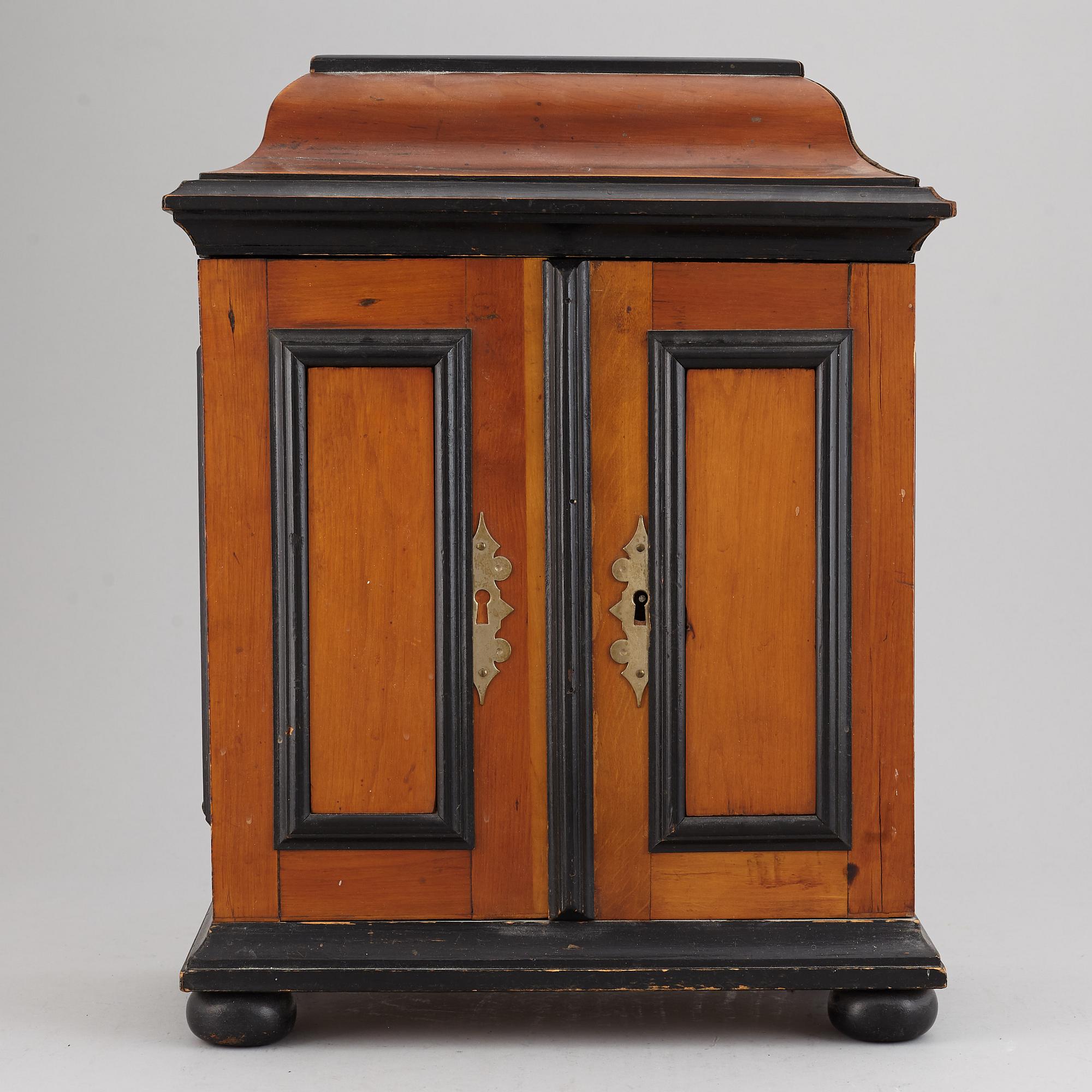 A barocque style spice cabinet, late 19th Century.