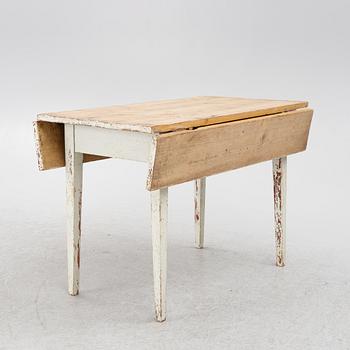 Drop-leaf table, circa 1900.
