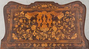 A Dutch 18th century Rococo chest of drawers.