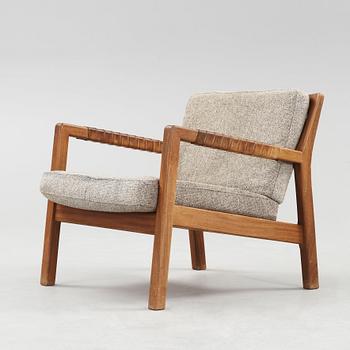 A Carl Gustaf Hiort af Ornäs walnut easy chair, Finland 1950's.
