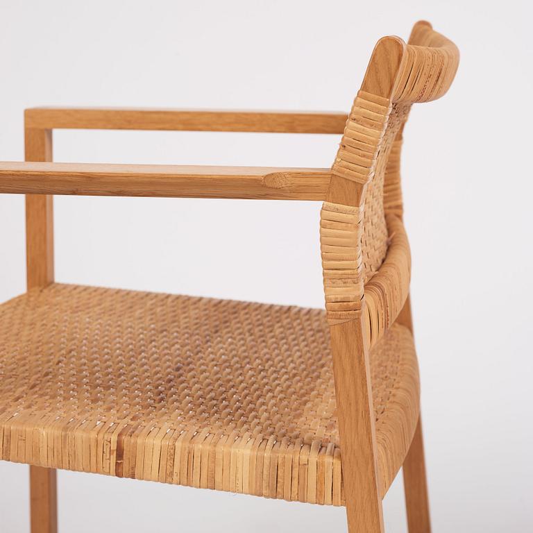 Børge Mogensen, a set of six oak and rattan 'BM61' chairs and a pair of BM62, Fredericia, Denmark, 1950s.