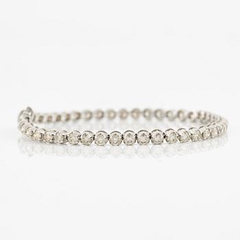 Tennis bracelet 18K white gold with brilliant-cut diamonds.