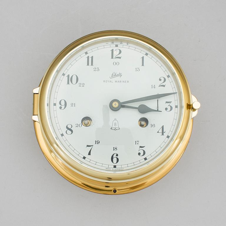 A brass wall clock, Schatz, Royal Mariner, second half of the 20th century.