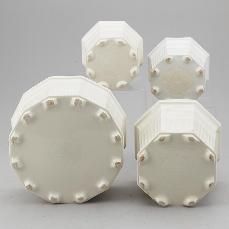 A set of four white glazed "Waldemarsudde" flower pots, Gustavsberg, Sweden, 20th Century.