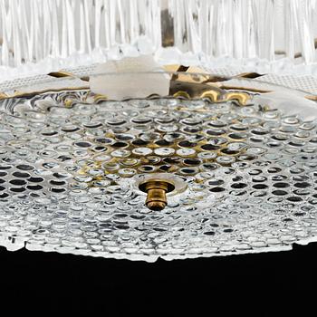 CARL FAGERLUND, a 20th century glass and brass ceiling lamp for Orrefors.