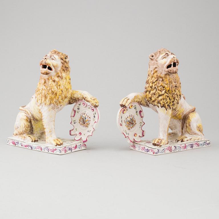 A PAIR OF FRENCH FAYENCE BOOK ENDS, 20th century.