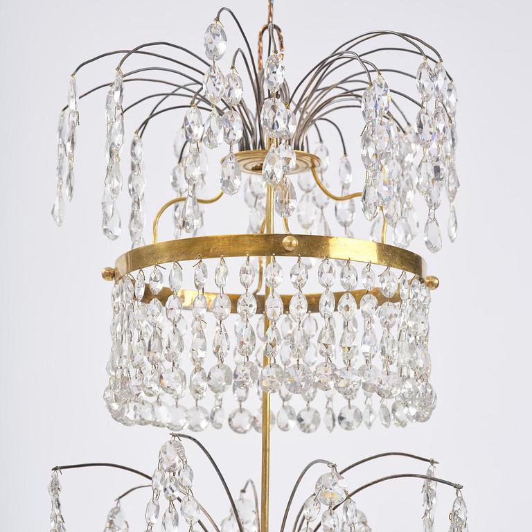 A late Gustavian gilt brass and cut glass eight-branch chandelier, Stockholm, late 18th century.