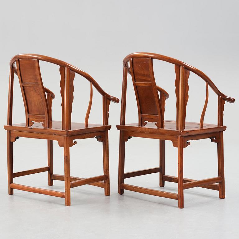 A pair of horseshoe-back armchairs, Qing dynasty (1644-1912).