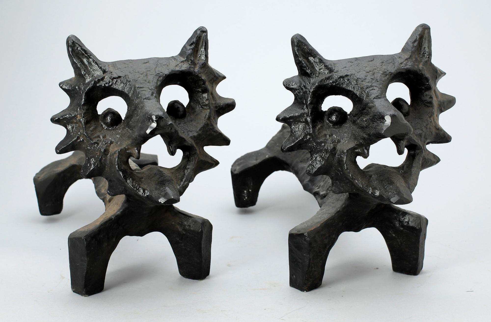 ELDHUNDAR, ett par, gjutjärn Olle Hermansson, Husqvarna.