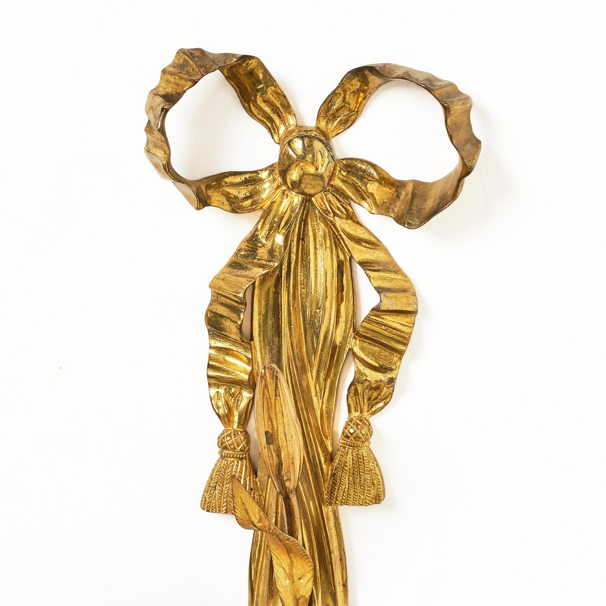 A pair of gilt bronze two-branch appliques after F. L. Rung, late 19th century,