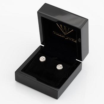 Brilliant and baguette cut diamond earrings.