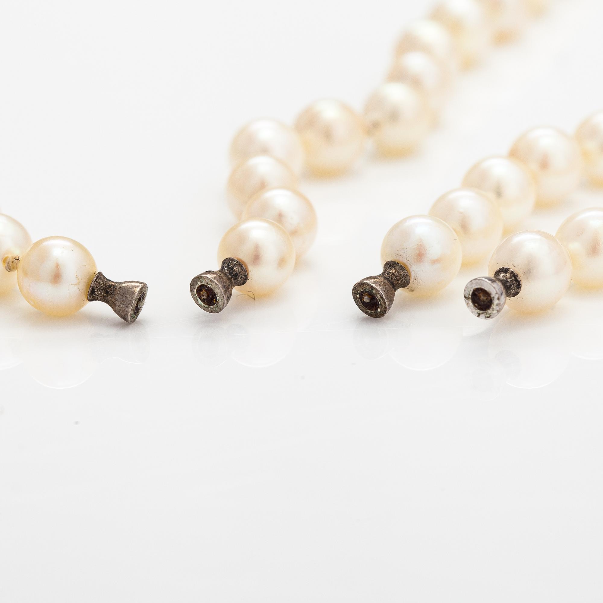 Two cultured pearl colliers without locks, silver parts. Probably Ole Lynggaard.