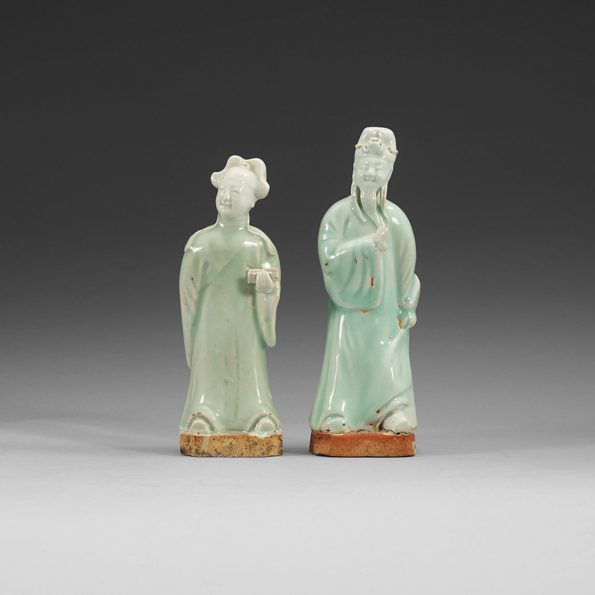 Two celadon glazed figures of daoistic deities, Qing dynasty, 18th Century.