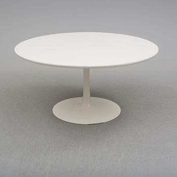 A dining table and eight chairs by Robin Day, Arkana.