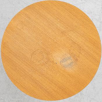 Yngve Ekström, a 'Lamino' armchair and sidetable, Swedese, Sweden, early 21st century.