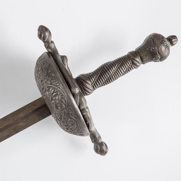Two swords, shield  and a halberd, late 19th century.