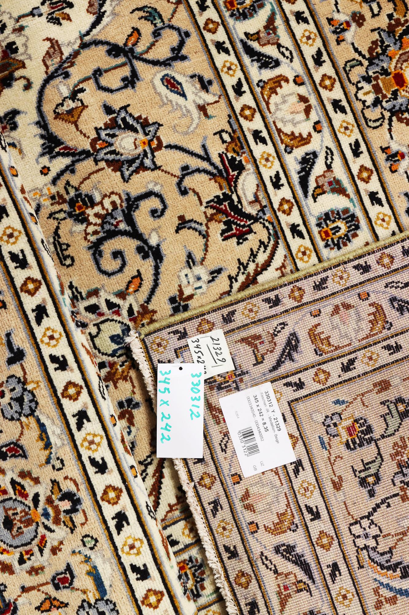 A Kashan carpet, c. 345 x 242 cm.