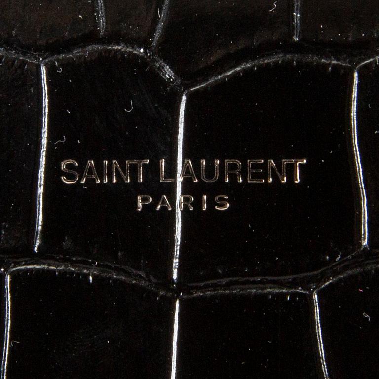 YVES SAINT LAURENT, a crocodile embossed green leather 'Sac du Jour small'.