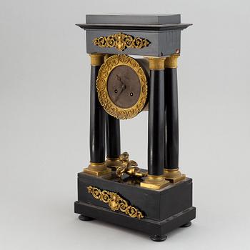 A late Empire´table clock.