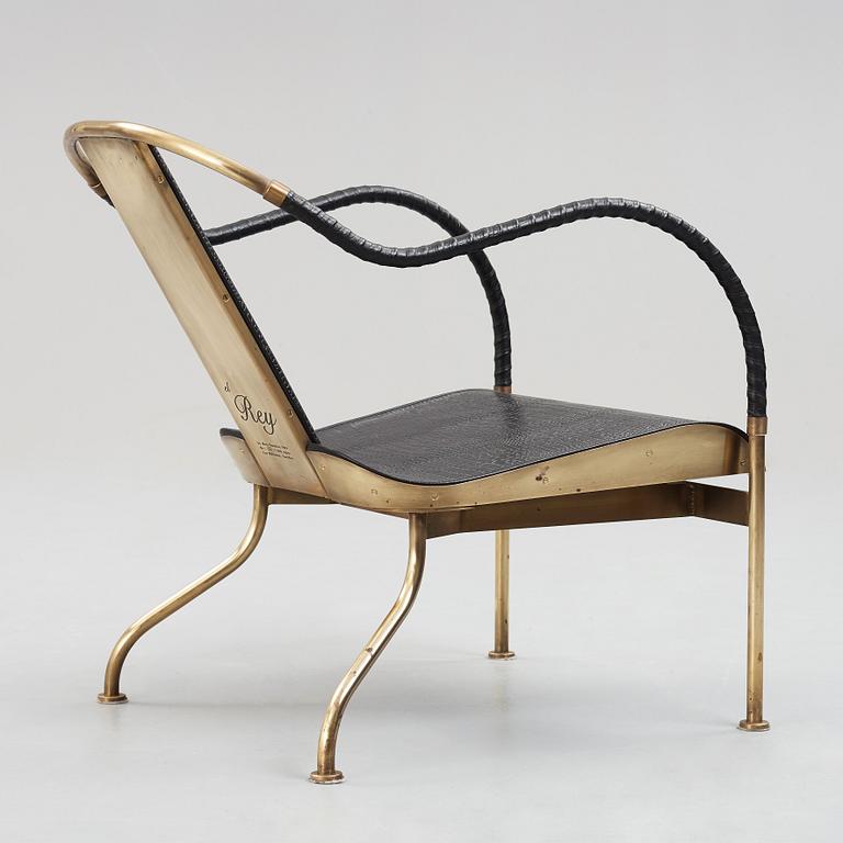 Mats Theselius, a brass and black leather el Rey chair, edition Källemo Sweden post 1999.