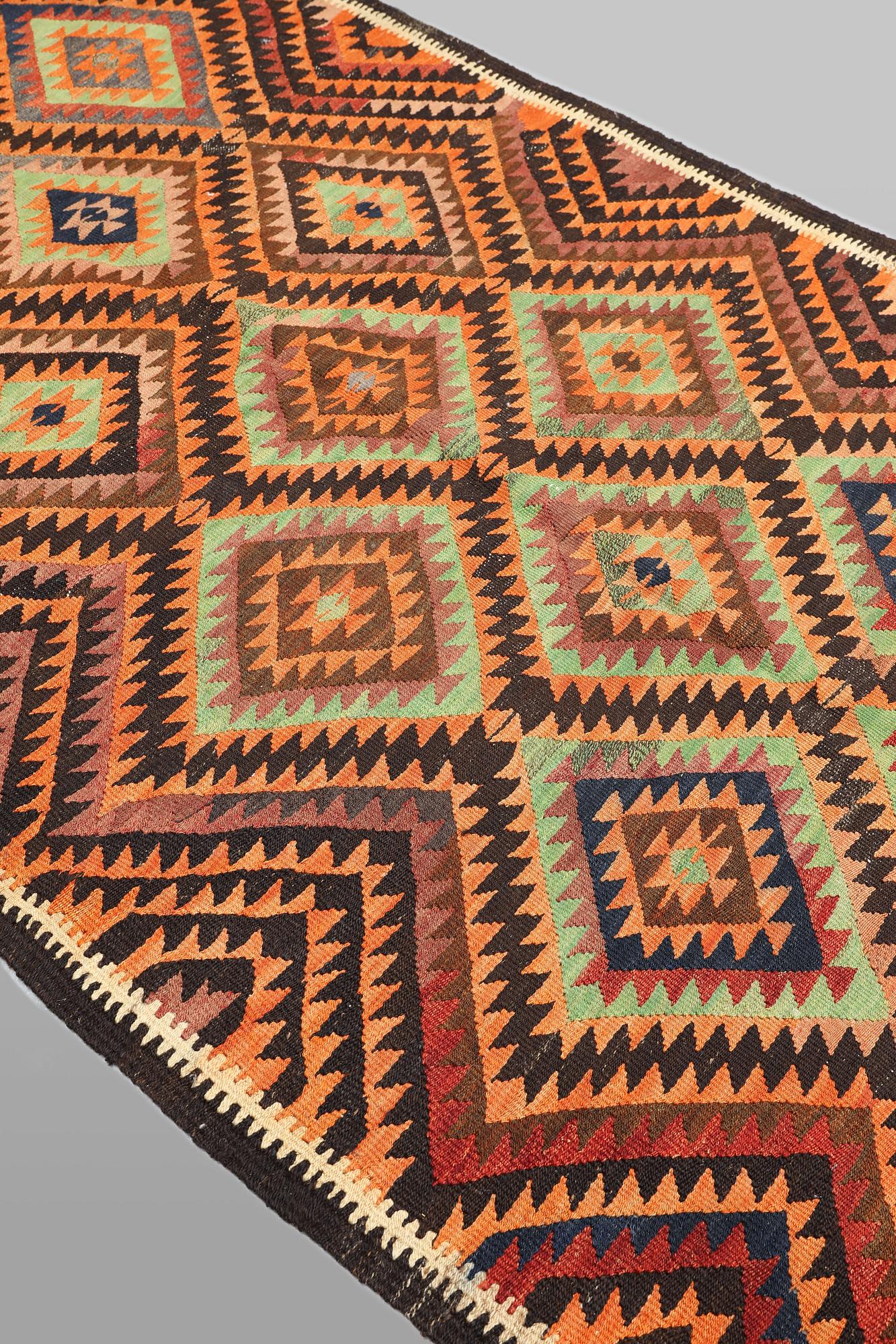 A  Persian nomadic Kilim rug, approx. 300 x 143 cm.