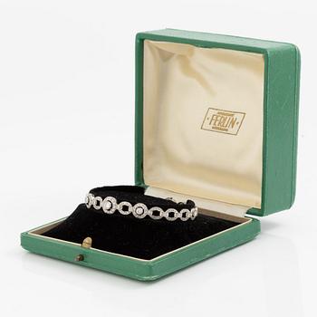 Bracelet in platinum set with round brilliant, octagonal, and rose-cut diamonds.