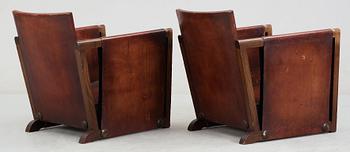 A pair of Axel Einar Hjorth brown leather 'Funkis' armchairs, Nordiska Kompaniet, Sweden ca 1930.