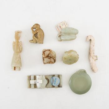 Figurines, belt buckles etc. China.