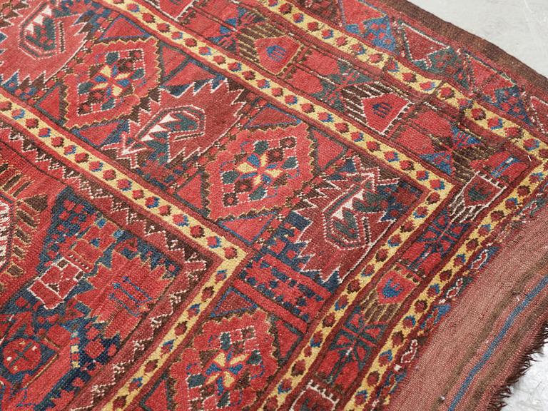 ANTIQUE BESHIR. 348,5 x 174,5 cm, as well as ca 10,5 cm stripe patterned flat weave at each end.