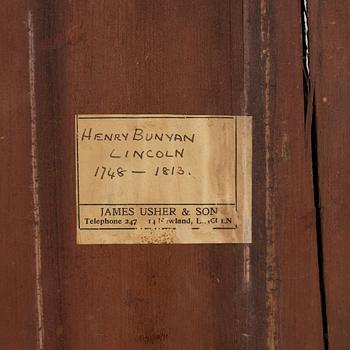 A mahognay long case clock from around the year 1800, H Bunyan Lincoln.