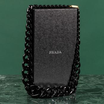 A necklace by PRADA.