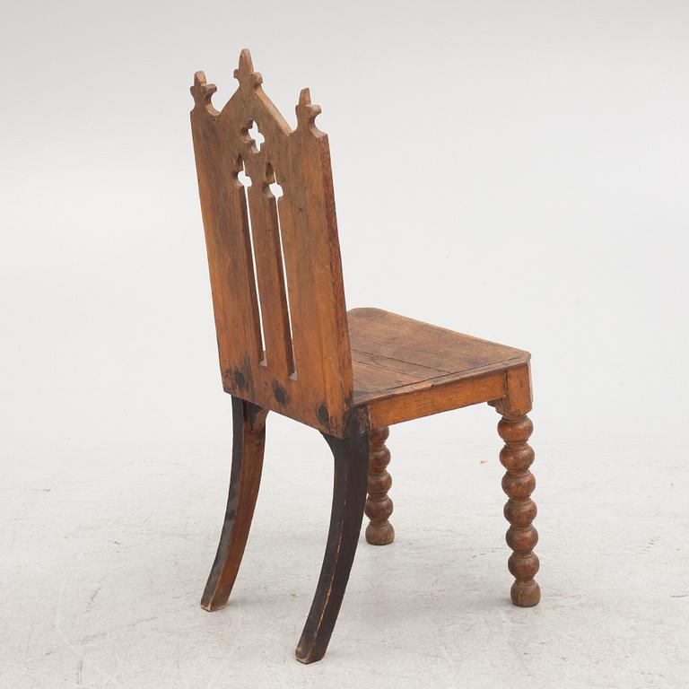 A carved Gothic-revival chair, 1830's/40's.