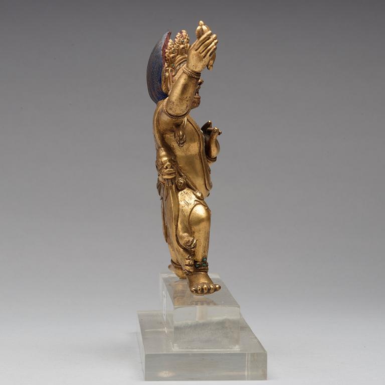 A Sinotibetan gilt bronze figure of Vajrapani, possibly 17/18th Century.