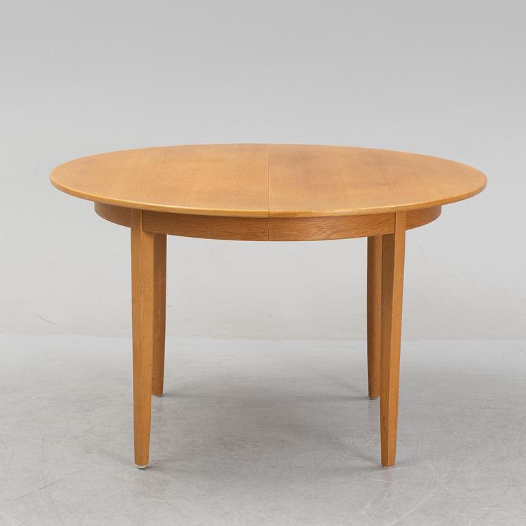 Carl Malmsten, an oak dining table, second half of the 20th century.