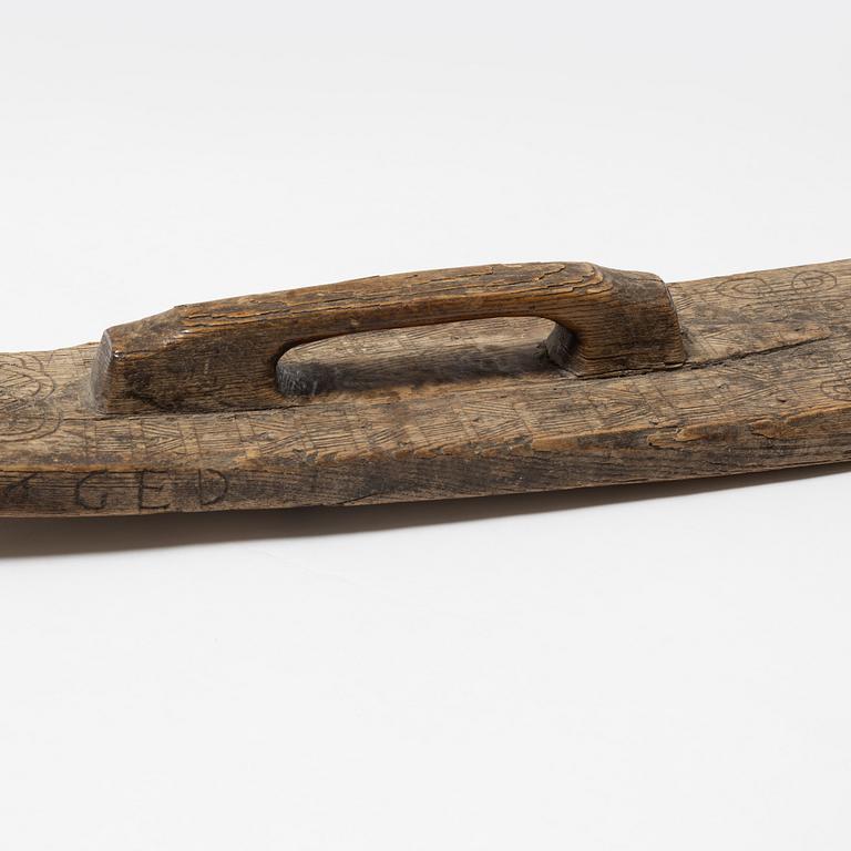 A Swedish folk art mangle board, dated 1666.