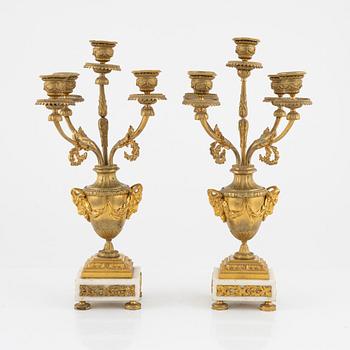 A pair of Louis XVI-style style candelabras, early 20th century.