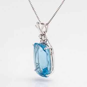 An 18K white gold neckalce with an aquamarine ca 13.27 ct and diamonds ca. 0.12 ct in total. With certificate.