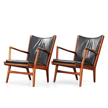 288. Hans J. Wegner, a pair of "AP16" teak and black leather armchairs, AP-stolen, Denmark 1950-60´s.