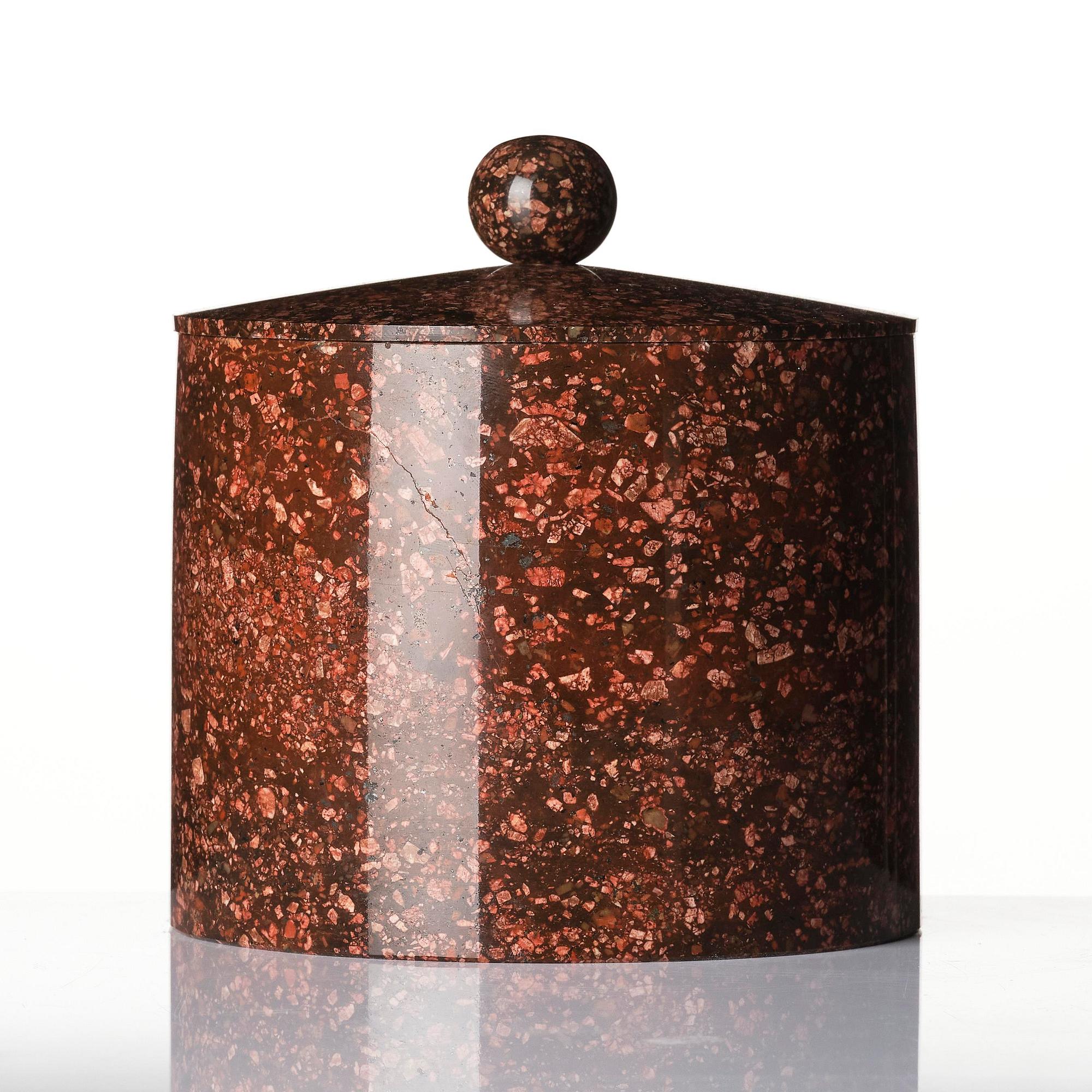 A Swedish Empire red 'Orrlok' porphyry tobacco jar, Älvdalen, first part 19th century.