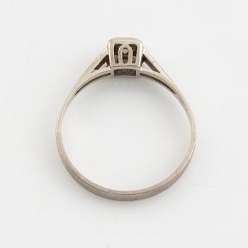 White gold and brilliant cut diamond ring.