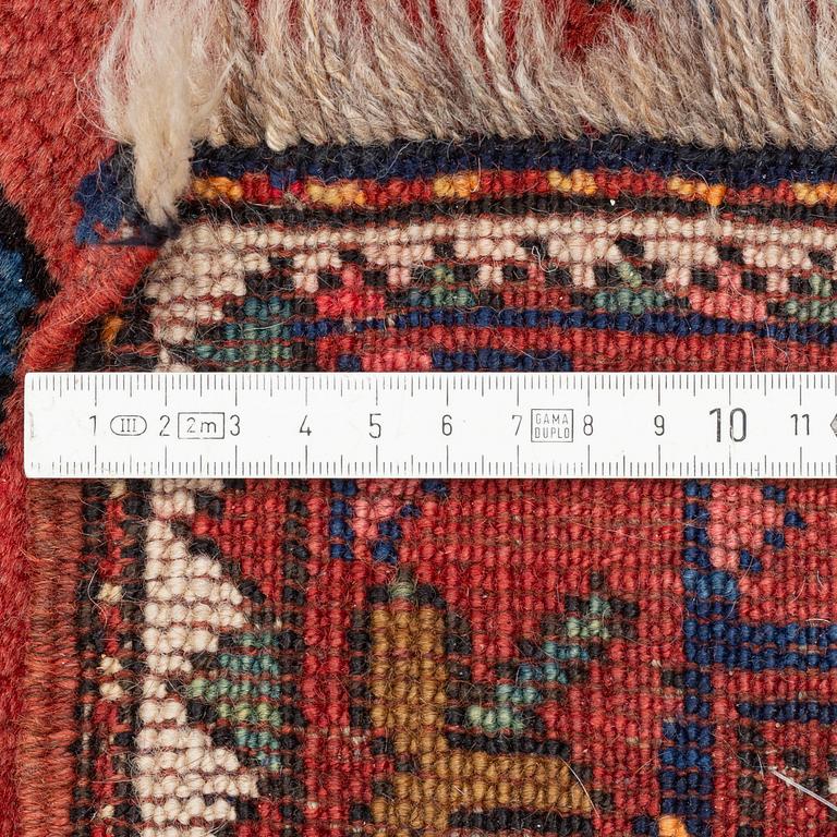 An antique carpet from south caucasus, probably Karabagh, ca 261 x 146 cm.