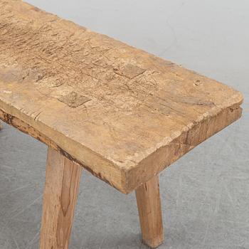 A pine bench, 19th Century.