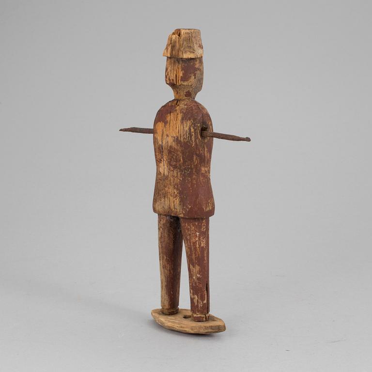 A wooden tool/sculpture, ca 1850.
