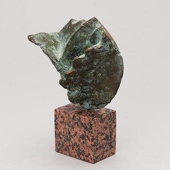 A bronze and granite sculpture, signed TR, dated 94, numbered 28/30.