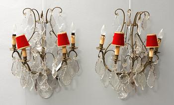 VÄGGLAMPETTER, ett par, rokokostil, 1800-tal.