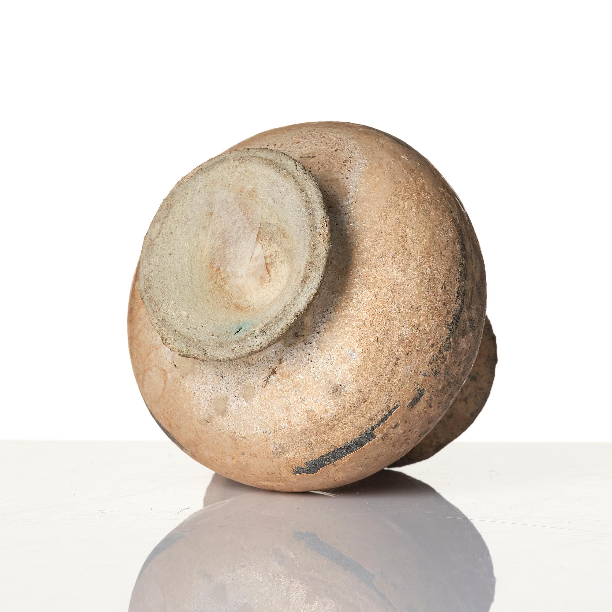 A central Asian pottery jug 12th-13th century.